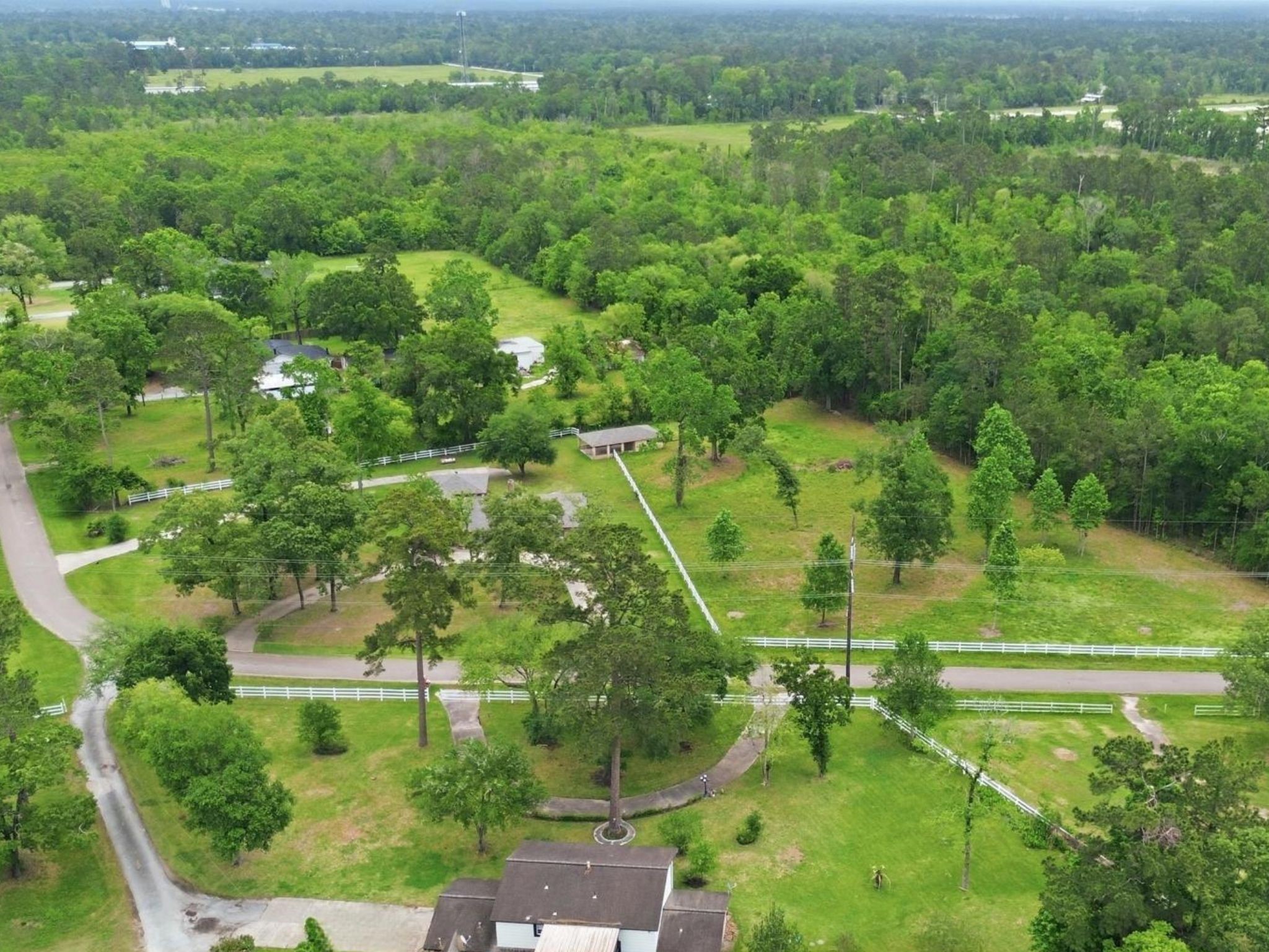 10240 Post Oak Drive Conroe, TX 77385 - Photo 46 of 46 an aerial view of residential houses with outdoor space and trees
