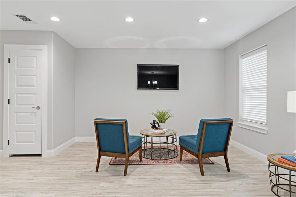 526 West Elm Street Denison, TX 75020 - Photo 3 of 17 Living area with recessed lighting and light wood-style floors