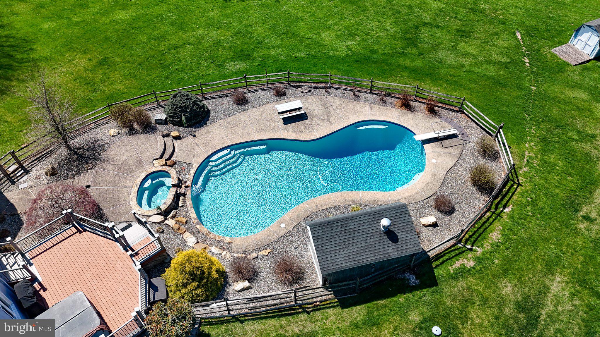 42 Eleanor Drive Spring City, PA 19475 - Photo 14 of 59 an aerial view of a swimming pool with outdoor seating and yard