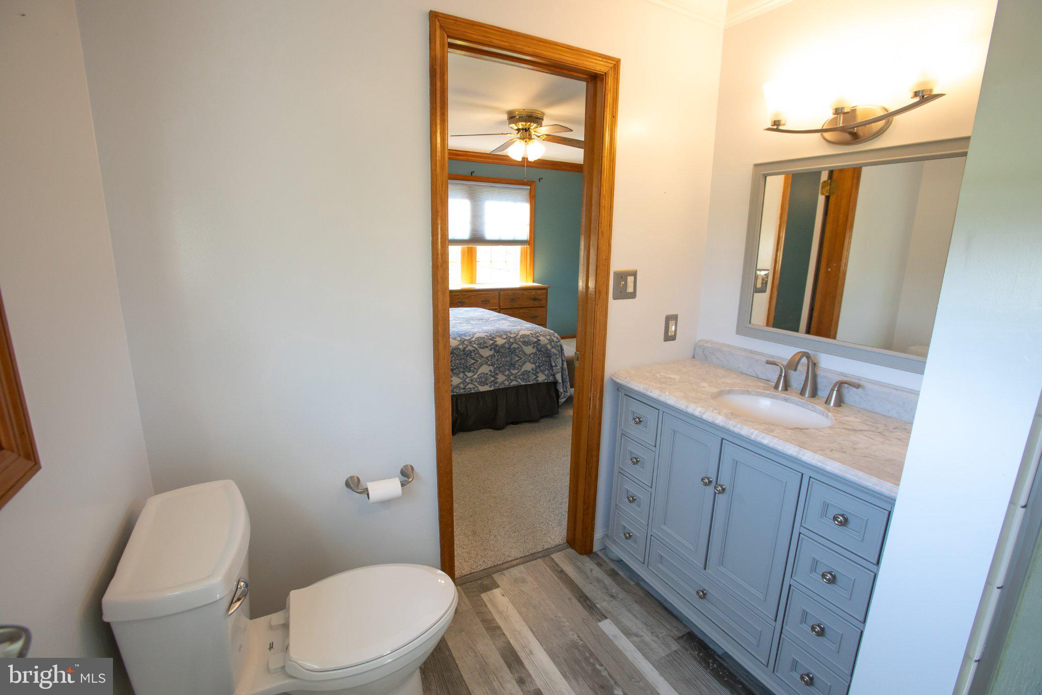 42 Eleanor Drive Spring City, PA 19475 - Photo 52 of 59 a bathroom with a granite countertop toilet sink and mirror