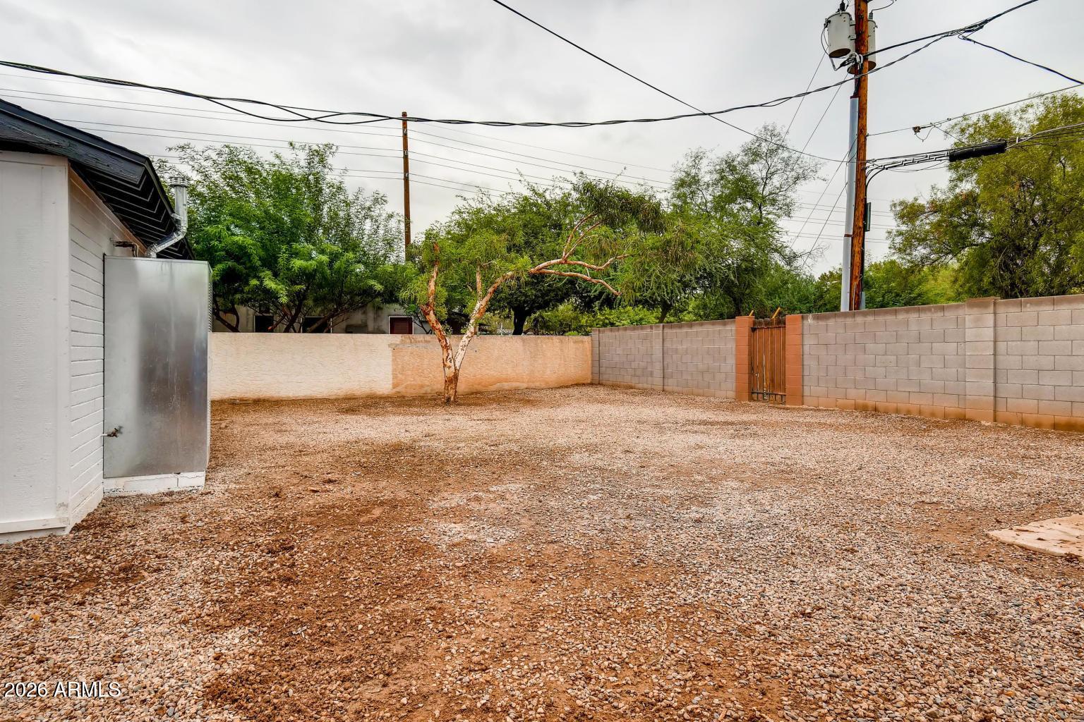 1806 East Don Carlos Tempe, AZ 85281 - Photo 14 of 14 a backyard of a house with lots of green space
