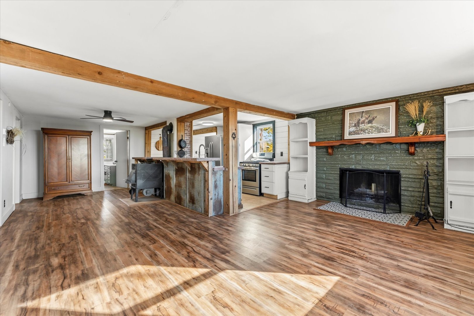 1311 East 4140 North Road Rankin, IL 60960 - Photo 19 of 54 a living room with furniture and a fireplace