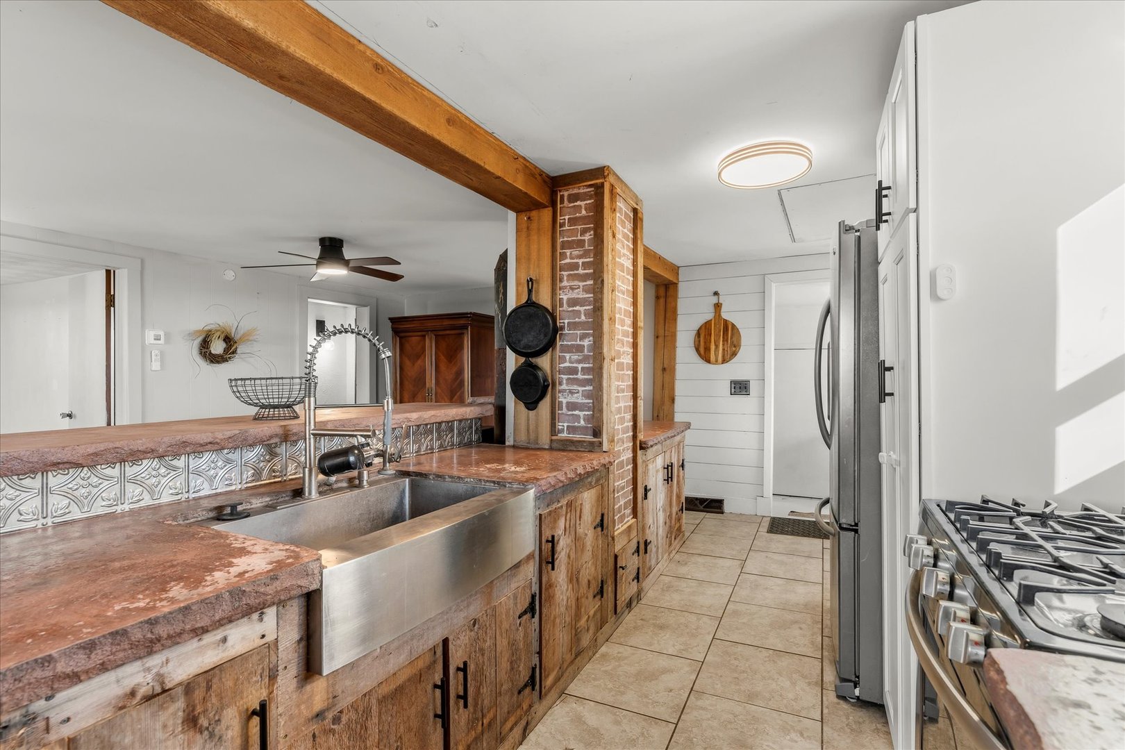 1311 East 4140 North Road Rankin, IL 60960 - Photo 22 of 54 a bathroom with a sink a mirror and a shower
