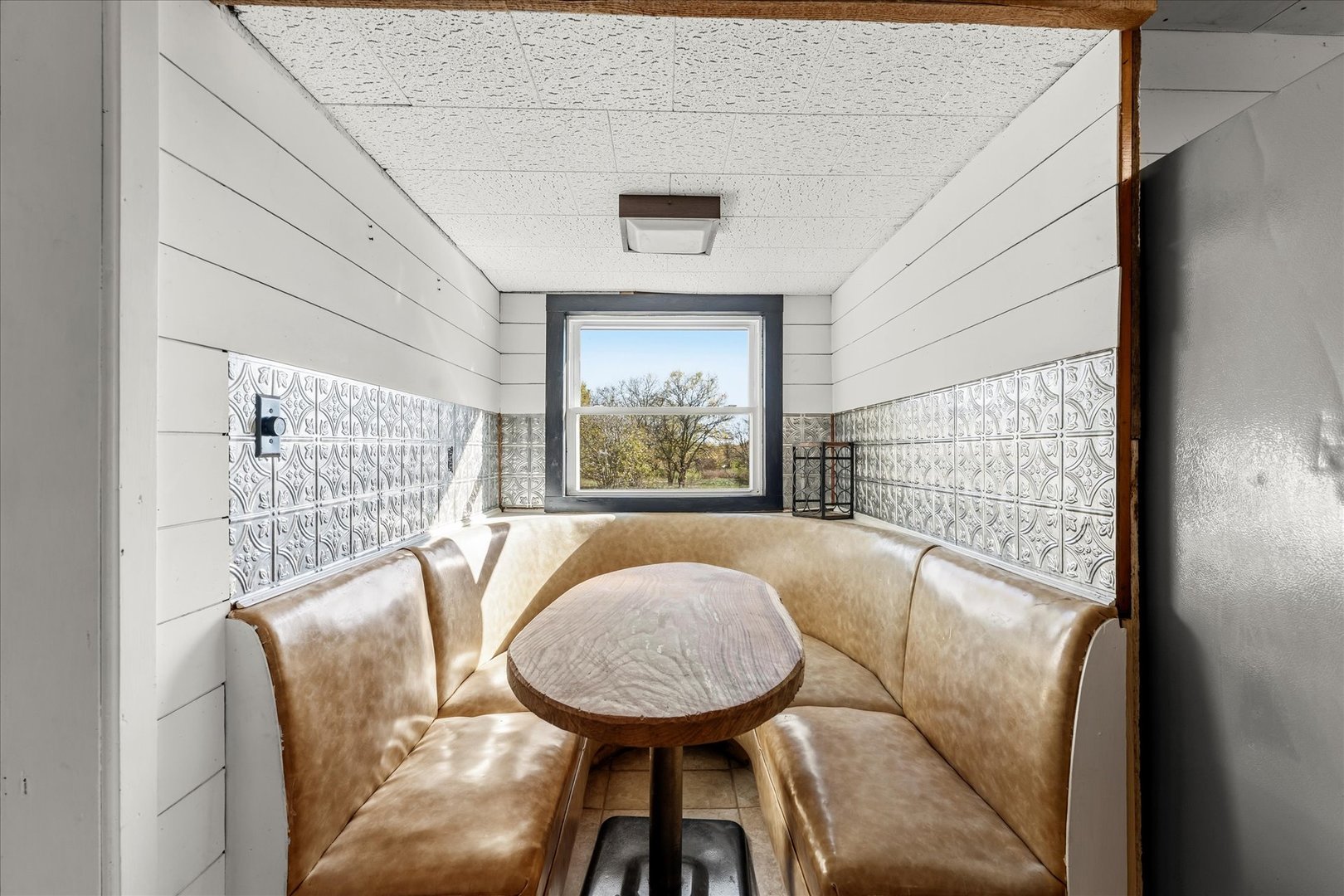 1311 East 4140 North Road Rankin, IL 60960 - Photo 25 of 54 a view of a dining room with furniture and window