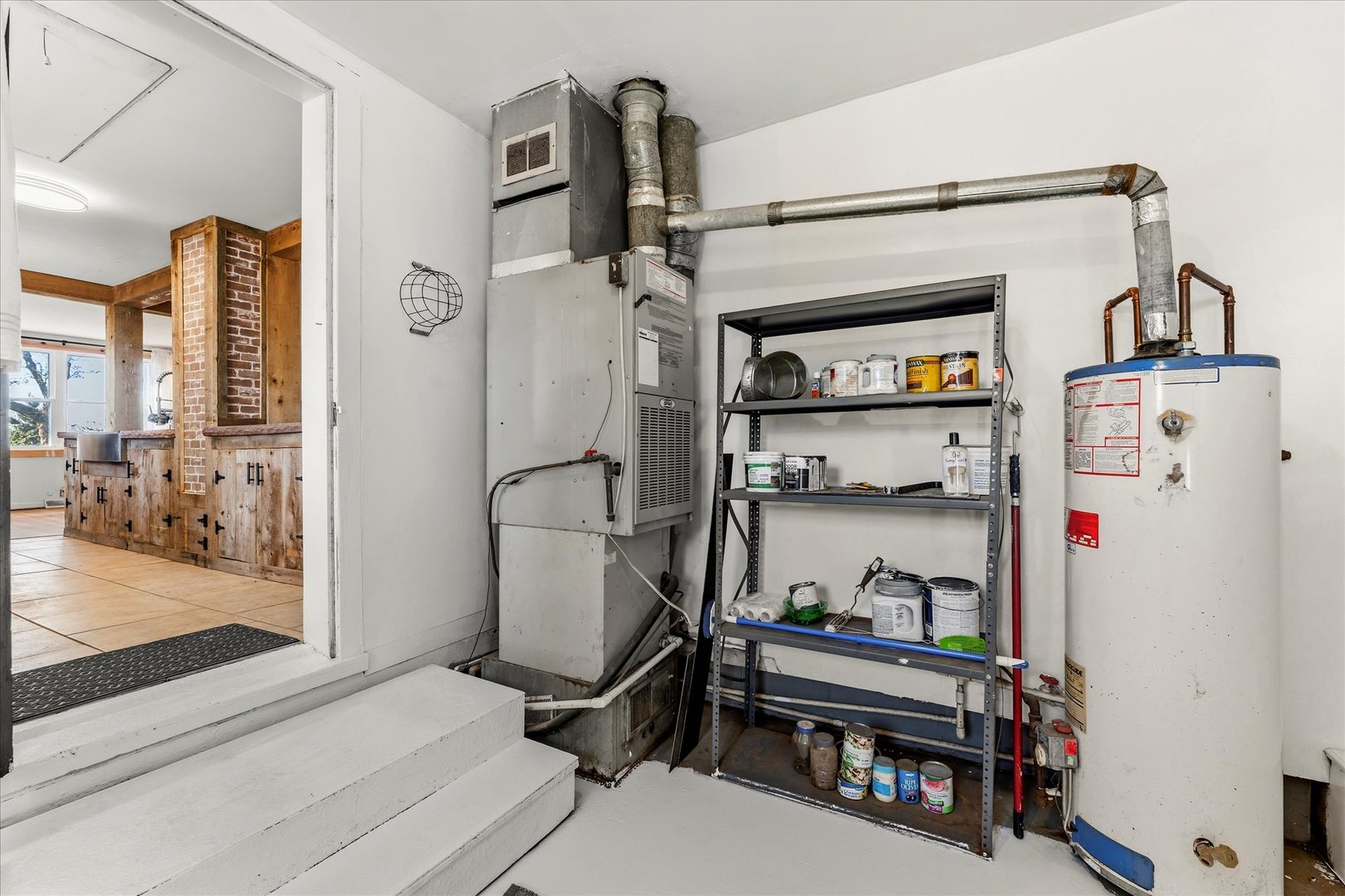 1311 East 4140 North Road Rankin, IL 60960 - Photo 31 of 54 a room with storage and utility