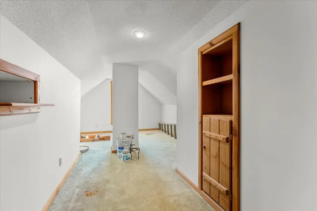 a view of balcony with wooden floor and fence