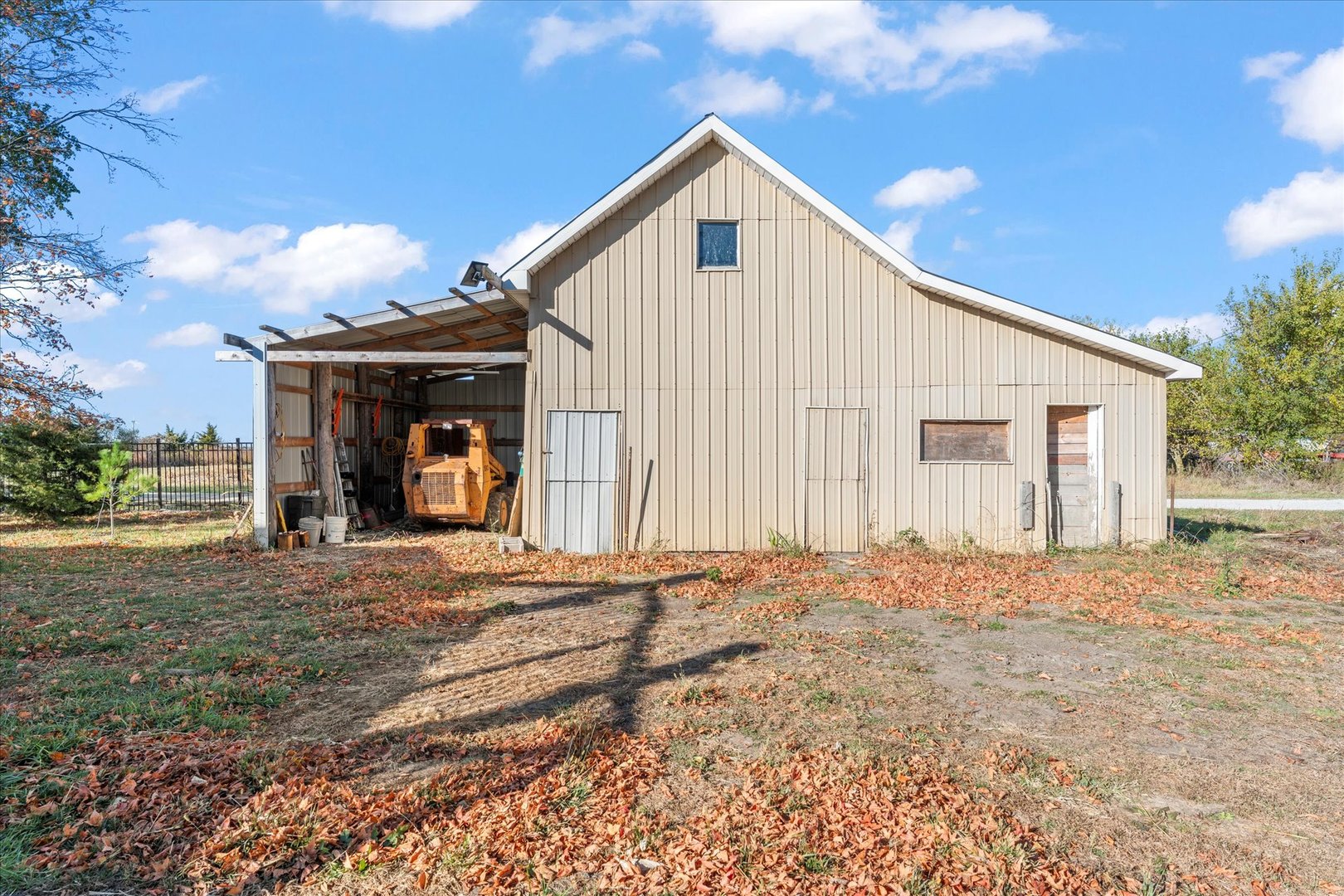 1311 East 4140 North Road Rankin, IL 60960 - Photo 43 of 54 a view of a house with a patio