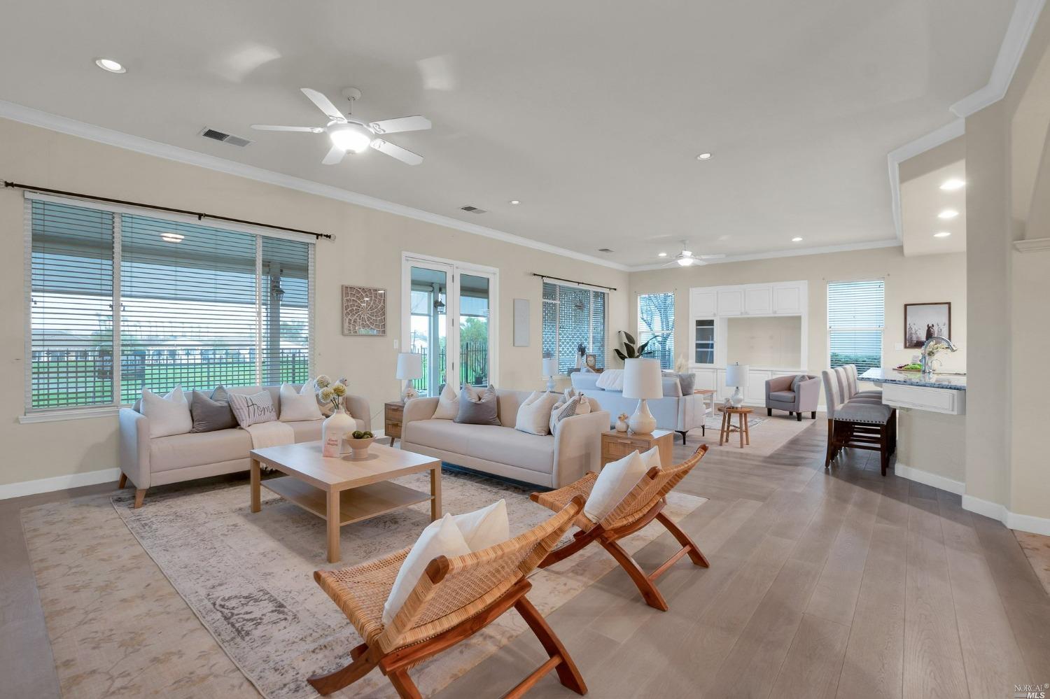 a living room with furniture and a table