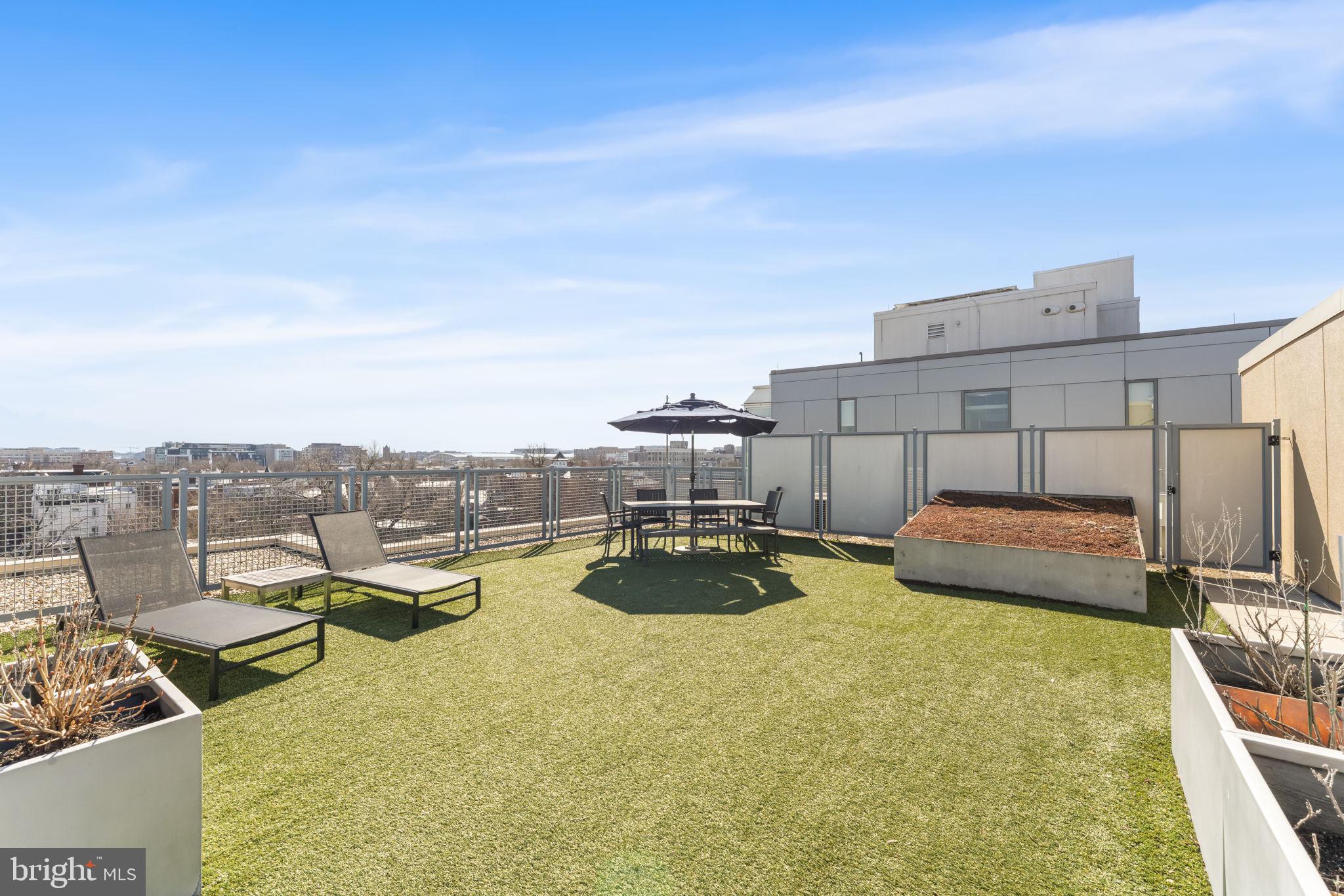 1529 14th Street Northwest, Unit 309 Washington, DC 20005 - Photo 16 of 21 a view of a swimming pool and lounge chair