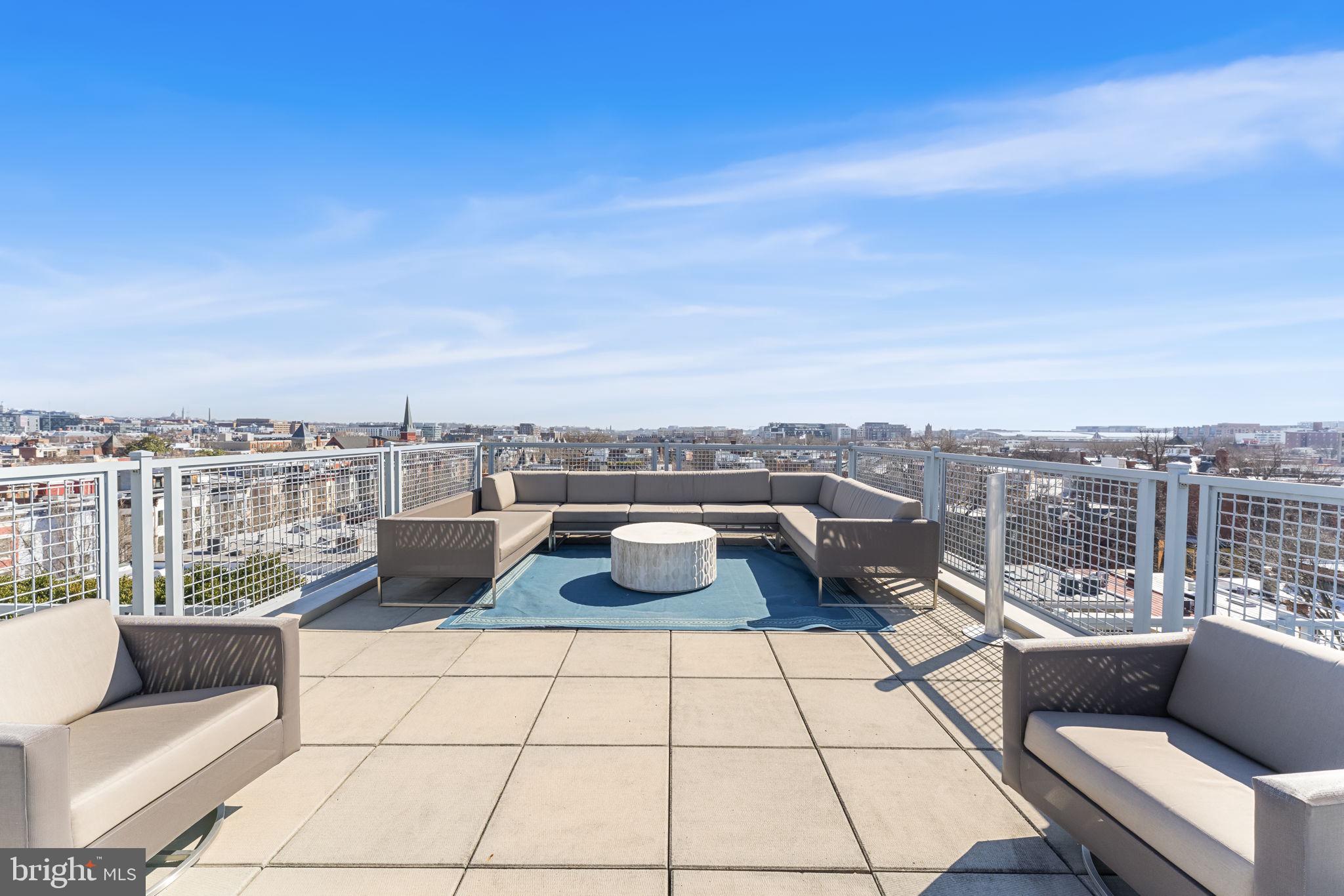 1529 14th Street Northwest, Unit 309 Washington, DC 20005 - Photo 19 of 21 a view of roof deck with seating space and barbeque oven