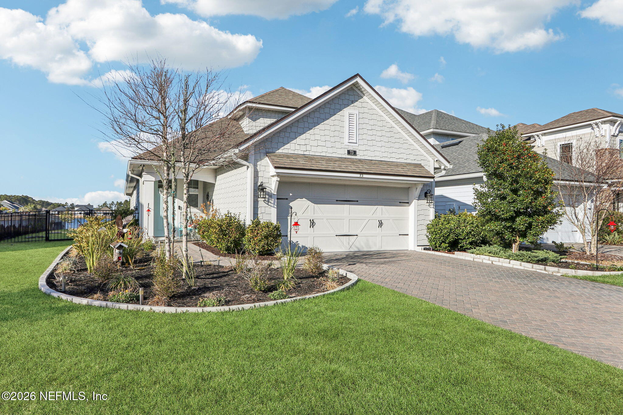 73 Andesite Trail Ponte Vedra, FL 32081 - Photo 1 of 42 a front view of a house with a yard