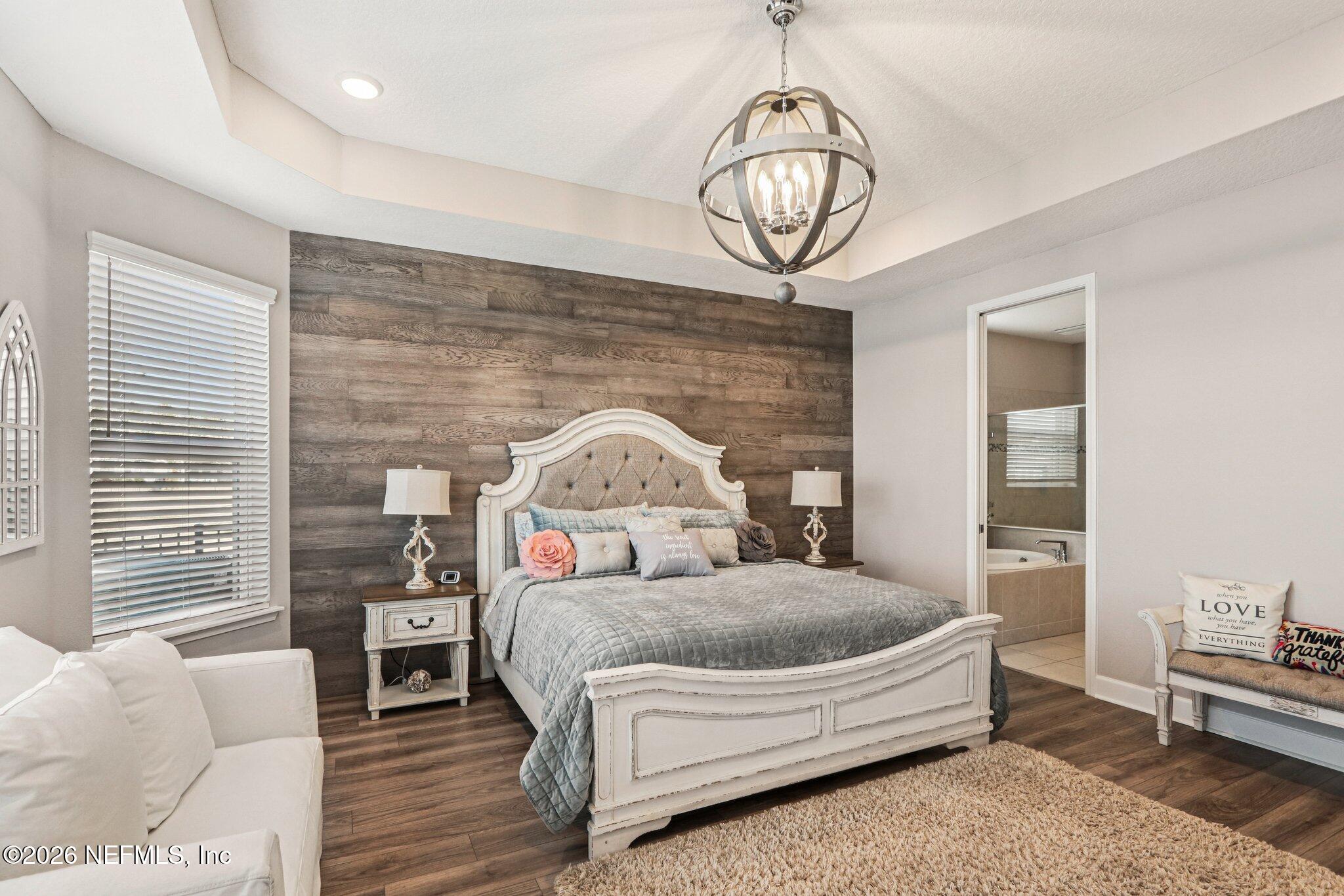 73 Andesite Trail Ponte Vedra, FL 32081 - Photo 16 of 42 a living room with a bed furniture and a window