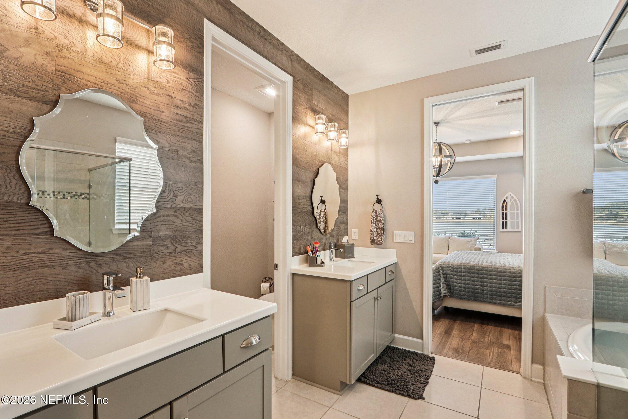 73 Andesite Trail Ponte Vedra, FL 32081 - Photo 19 of 42 a en suite bathroom with a double vanity sink and a mirror