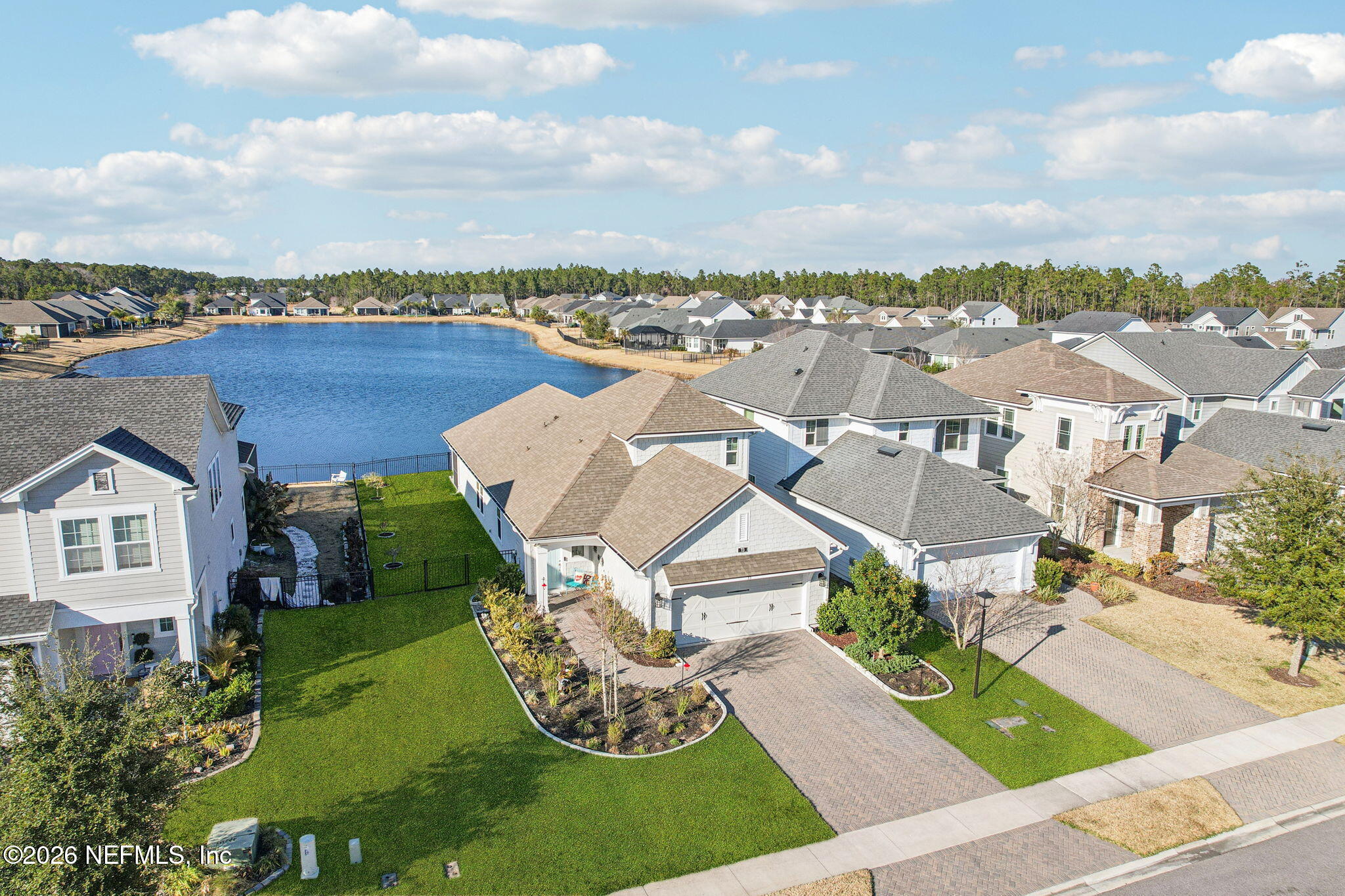 73 Andesite Trail Ponte Vedra, FL 32081 - Photo 3 of 42 an aerial view of a house with garden space and lake view in back