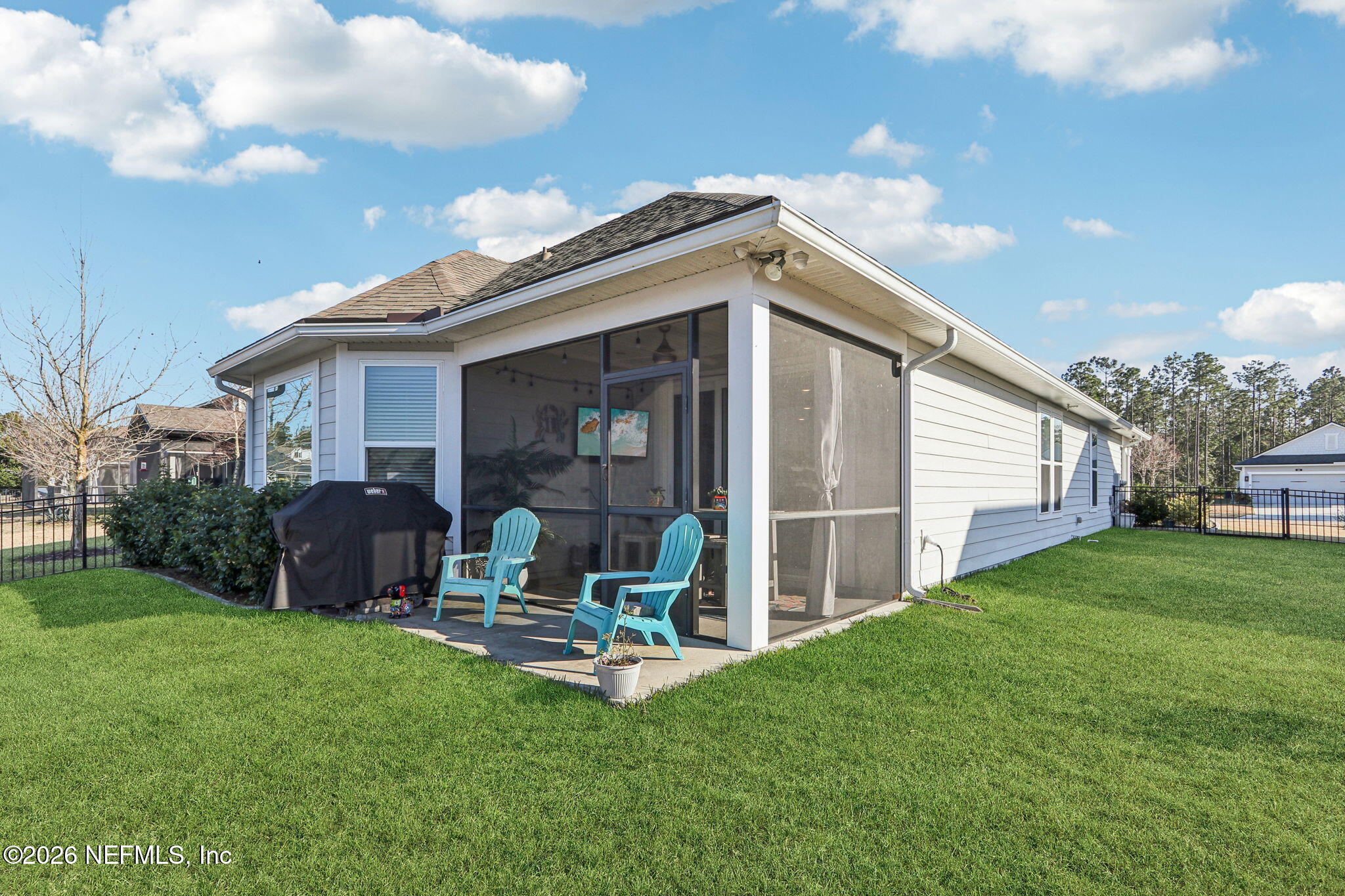 73 Andesite Trail Ponte Vedra, FL 32081 - Photo 33 of 42 a view of a chair and table in backyard of the house