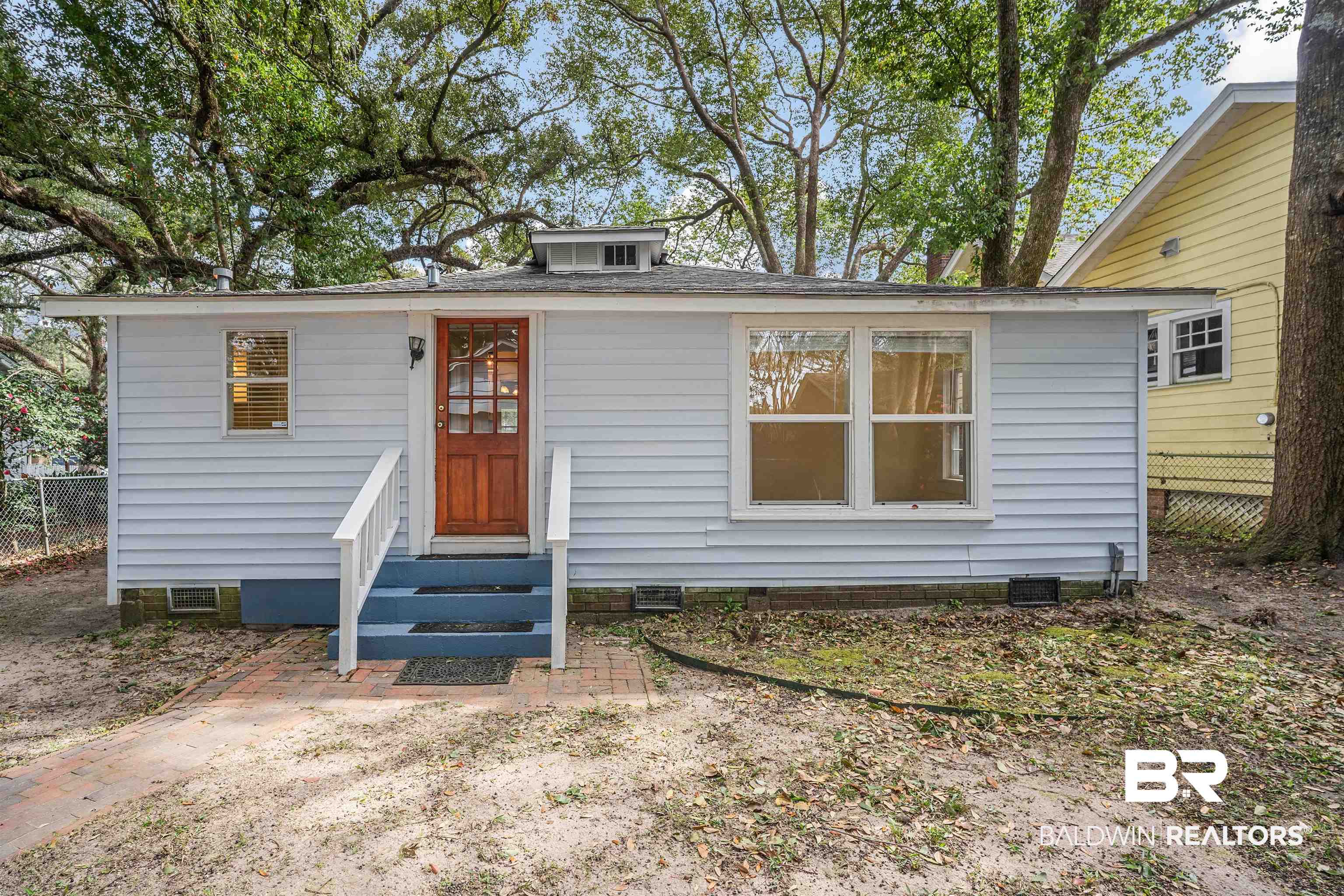 118 Mohawk Street Mobile, AL 36606 - Photo 23 of 26 View of front of house with entry steps and crawl space
