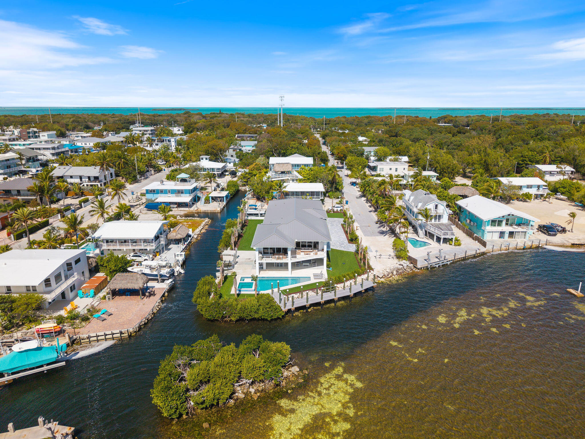 1002 Snapper Lane Key Largo, FL 33037 - Photo 96 of 106 an aerial view of residential houses with outdoor space