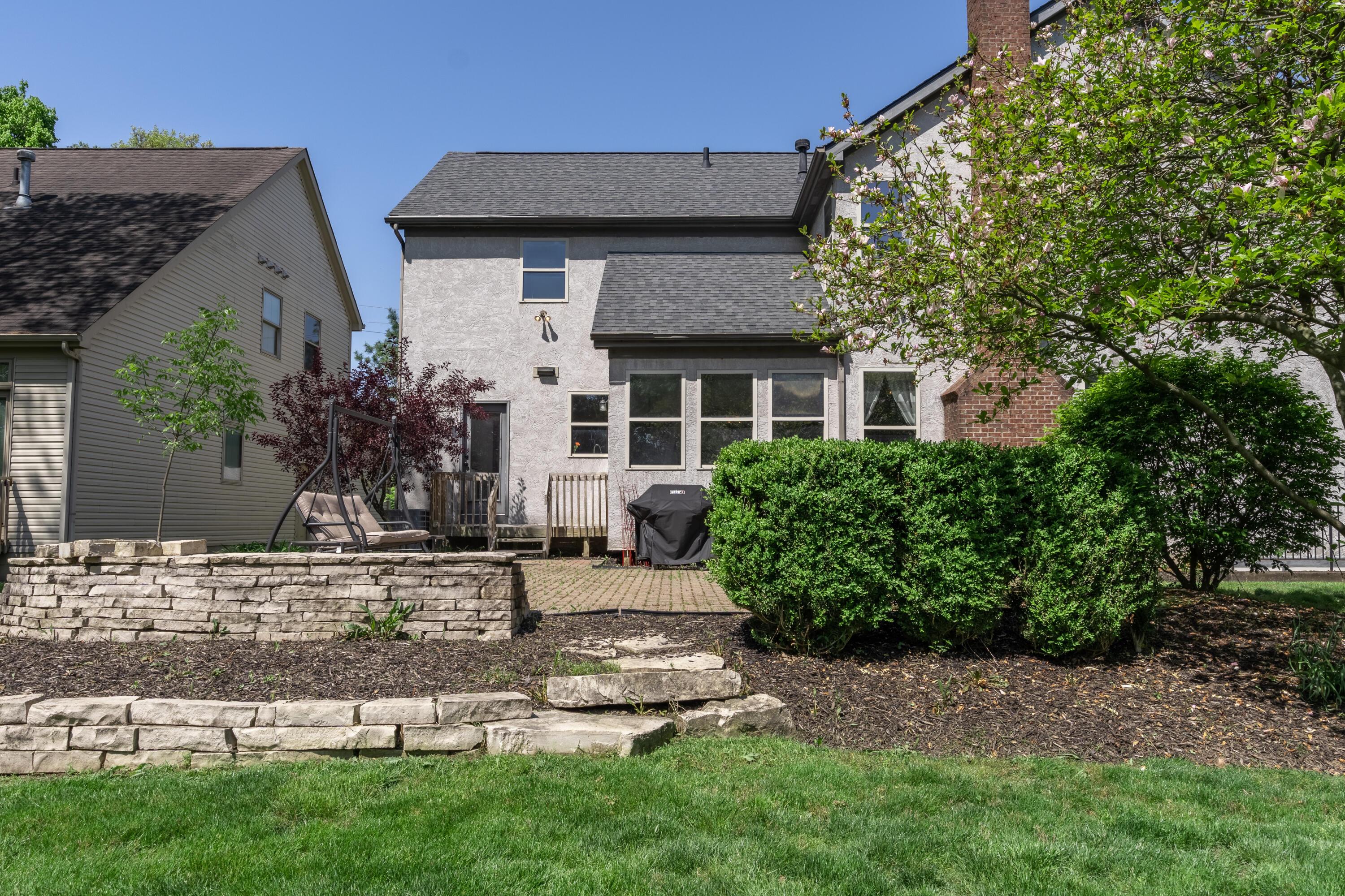 7168 Linworth Road Columbus, OH 43235 - Photo 28 of 34 Backyard with extensive landscaping