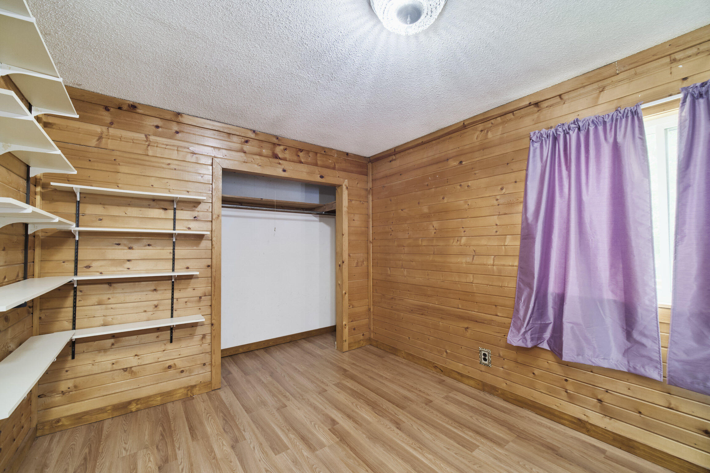 925 South High Bridge Road Wellston, MI 49689 - Photo 22 of 55 Primary bedroom