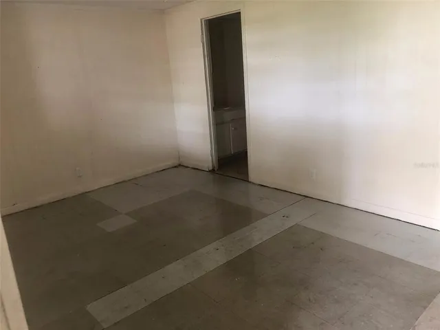 an empty room with closet