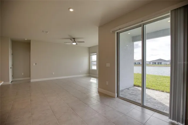 a view of an empty room and window