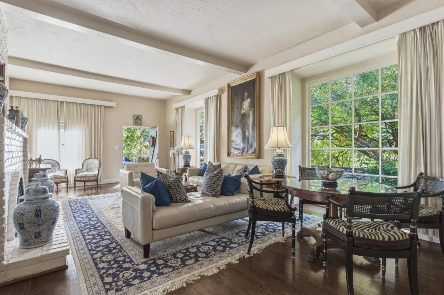 25286 Hatton Road Carmel, CA 93923 - Photo 9 of 34 a living room with furniture and large windows