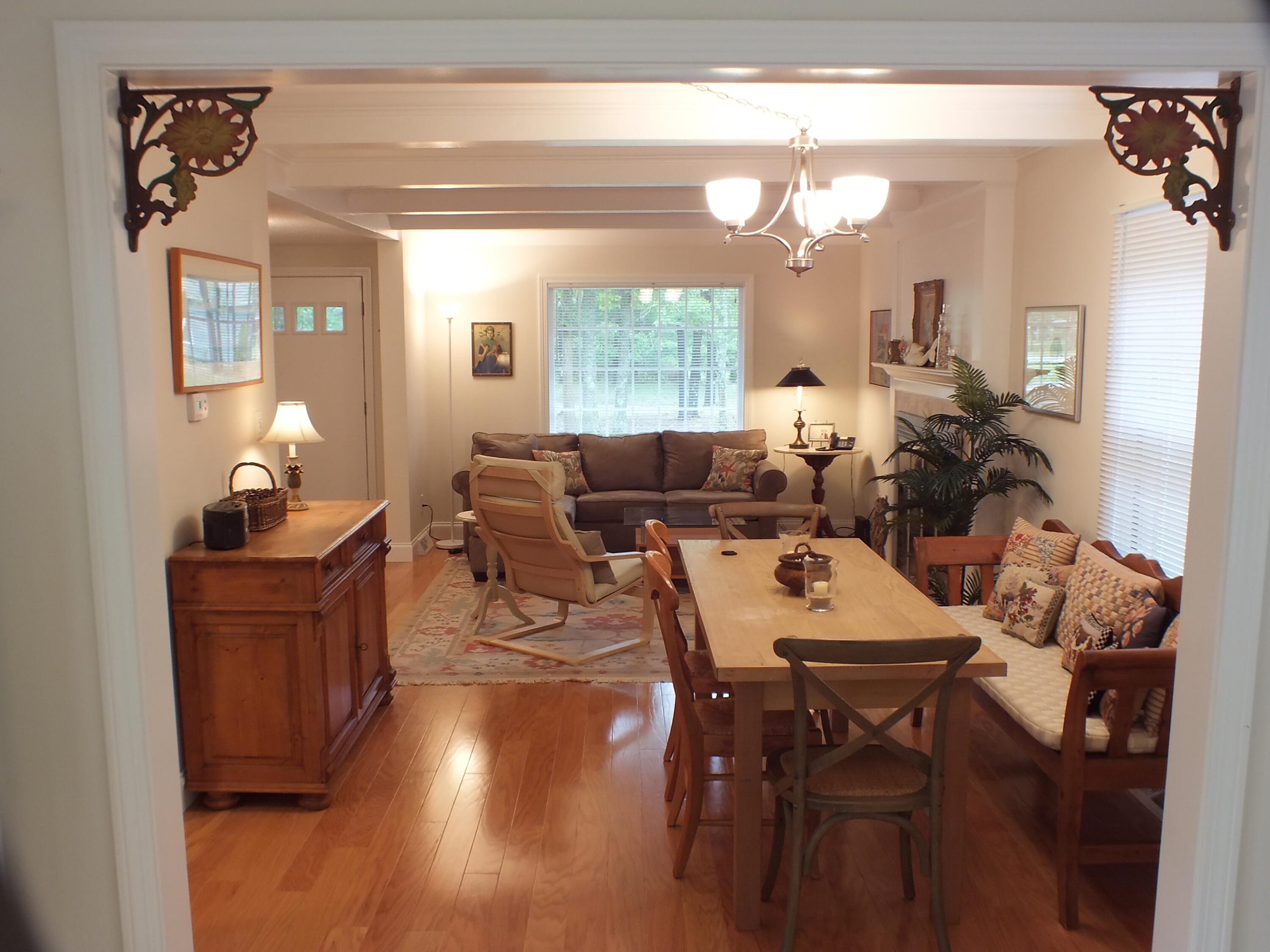 5 Amos Landing Road Mashpee, MA 02649 - Photo 13 of 27 a living room with furniture a large window and wooden floor