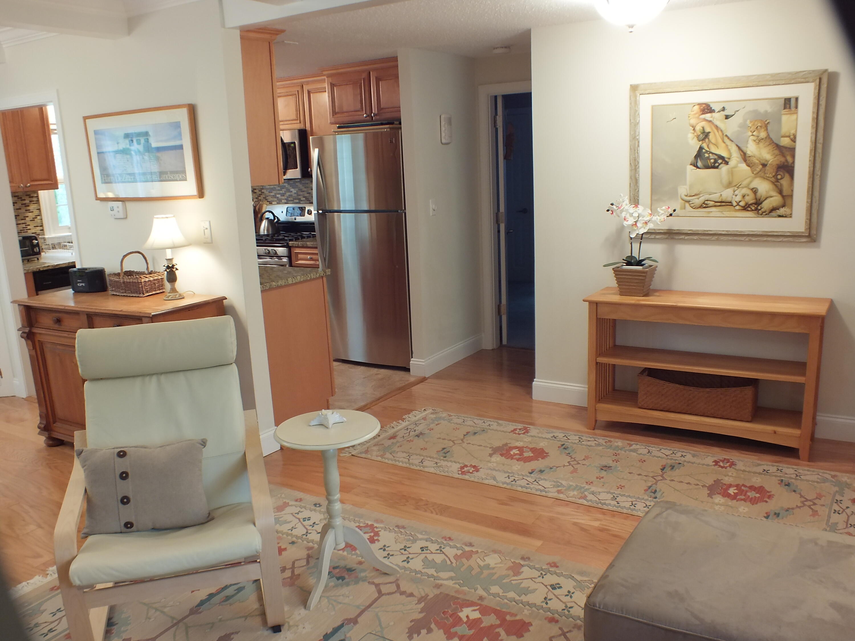 5 Amos Landing Road Mashpee, MA 02649 - Photo 18 of 27 a living room with furniture a refrigerator and a couch