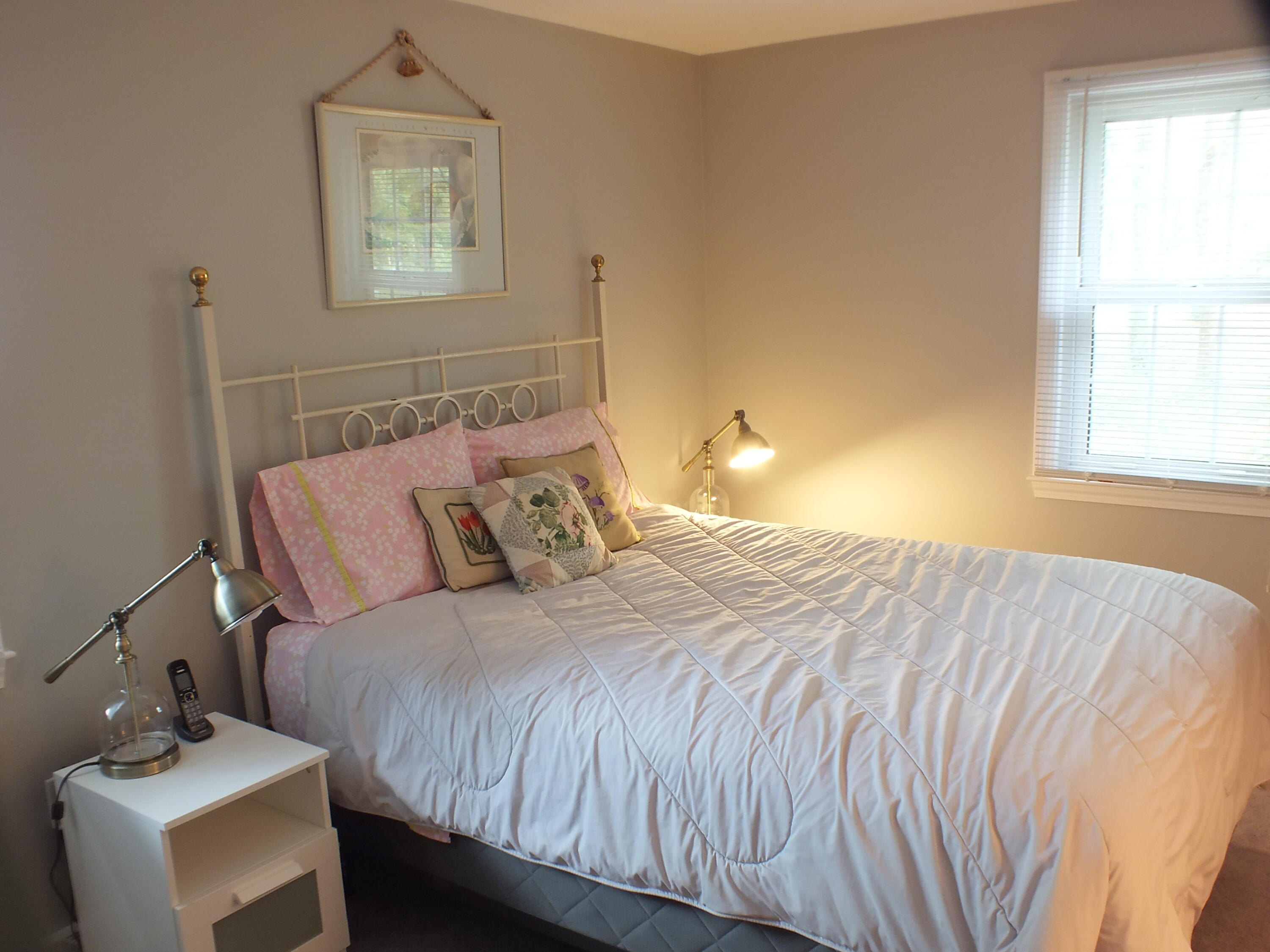 5 Amos Landing Road Mashpee, MA 02649 - Photo 19 of 27 a bedroom with a bed and a window
