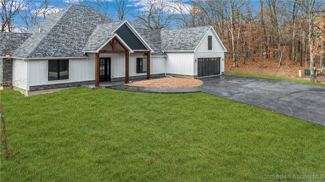 $789,900 | 971 Grand Point Boulevard, Sunrise Beach, MO 65079