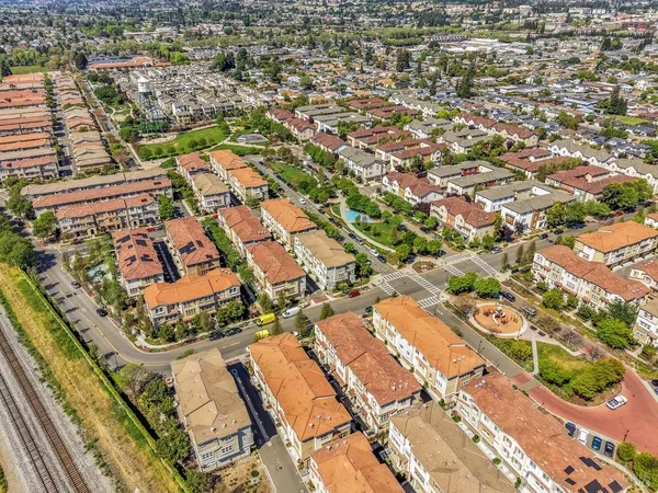an aerial view of residential building and parking space