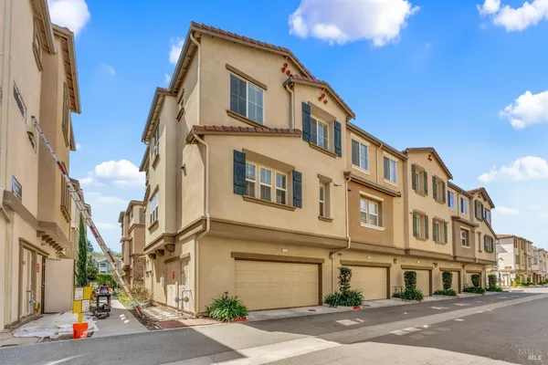 a front view of a building with a street