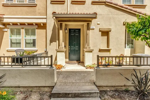 front view of a house with a balcony