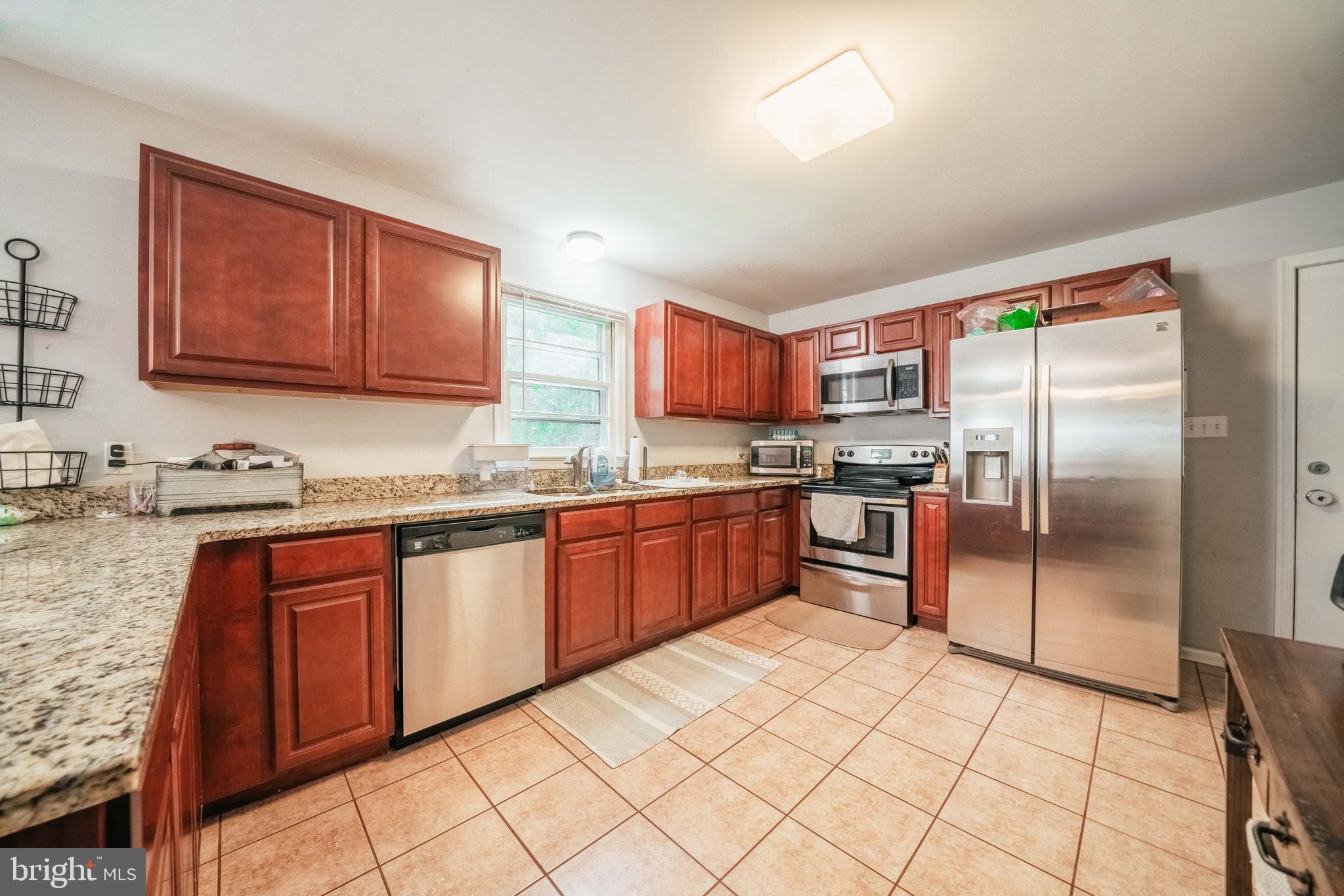 13347 Silver Hill Road Sumerduck, VA 22742 - Photo 5 of 32 Kitchen with SS applicances, granite, tile