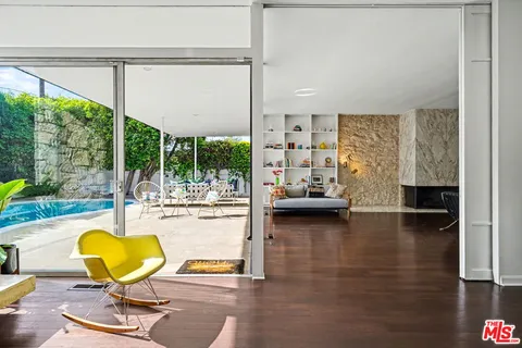 a living room with furniture and a couch