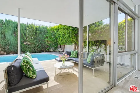 a outdoor space with furniture and garden view