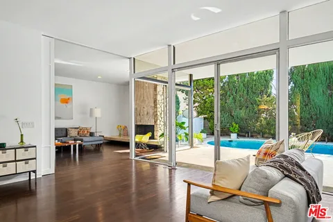 a living room with furniture and a table