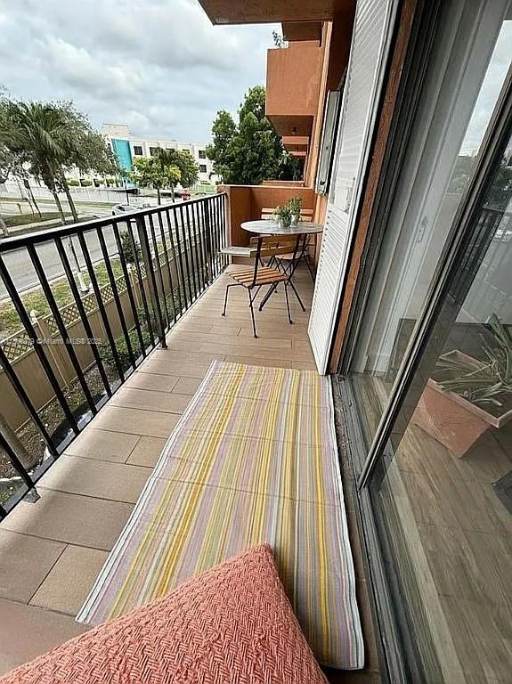 1800 West 54th Street, Unit 105 Hialeah, FL 33012 - Photo 29 of 59 a balcony with view of balcony