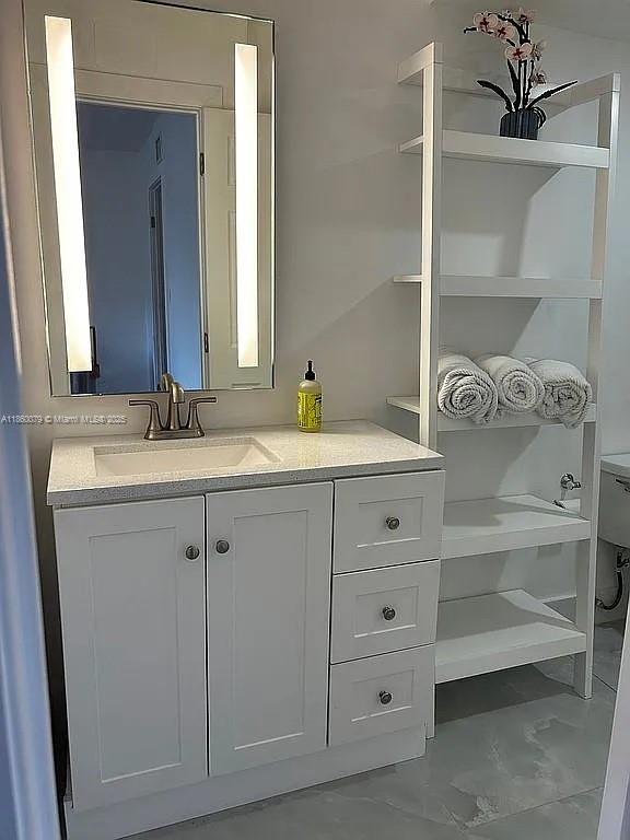 1800 West 54th Street, Unit 105 Hialeah, FL 33012 - Photo 35 of 59 a bathroom with a sink and a mirror