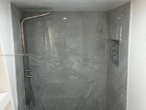 1800 West 54th Street, Unit 105 Hialeah, FL 33012 - Photo 36 of 59 a bathroom with a glass shower door