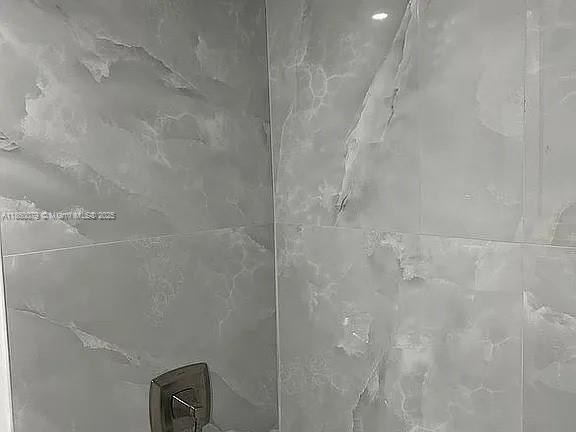 1800 West 54th Street, Unit 105 Hialeah, FL 33012 - Photo 43 of 59 a bathroom with a shower