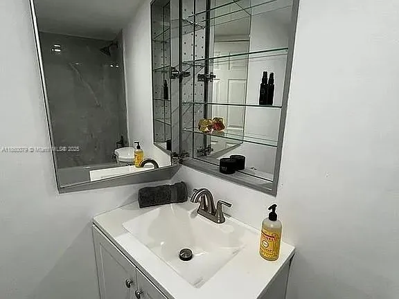 a living room with a couch and a large window