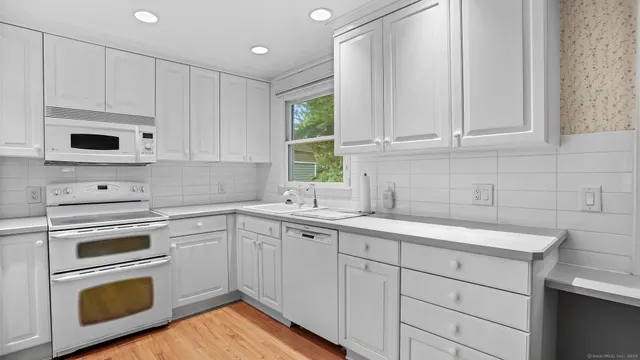 a dining room with furniture window wooden floor