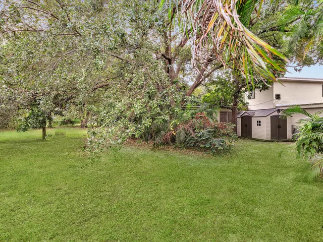 a kitchen with stainless steel appliances a refrigerator and a stove