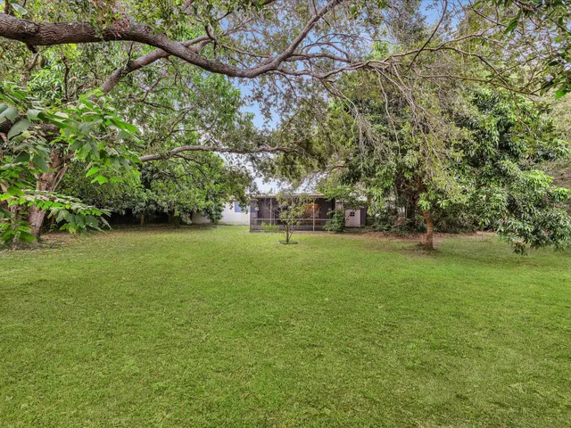 a bathroom with a sink a mirror and a bathtub