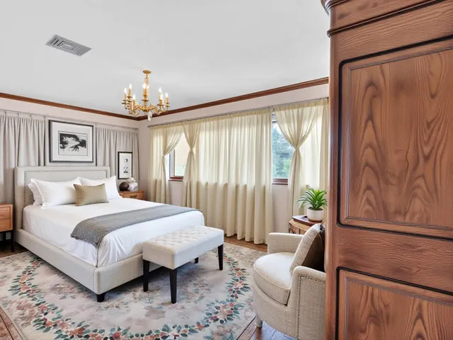 a view of house with a yard