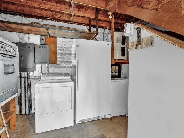 an aerial view of residential houses with yard