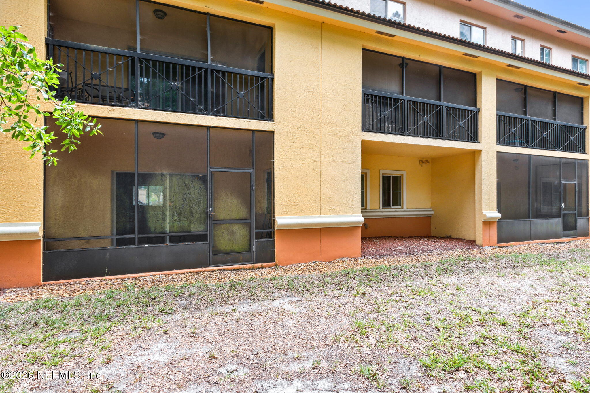 9745 Touchton Road, Unit 1205 Jacksonville, FL 32246 - Photo 19 of 20 a front view of a house with a yard