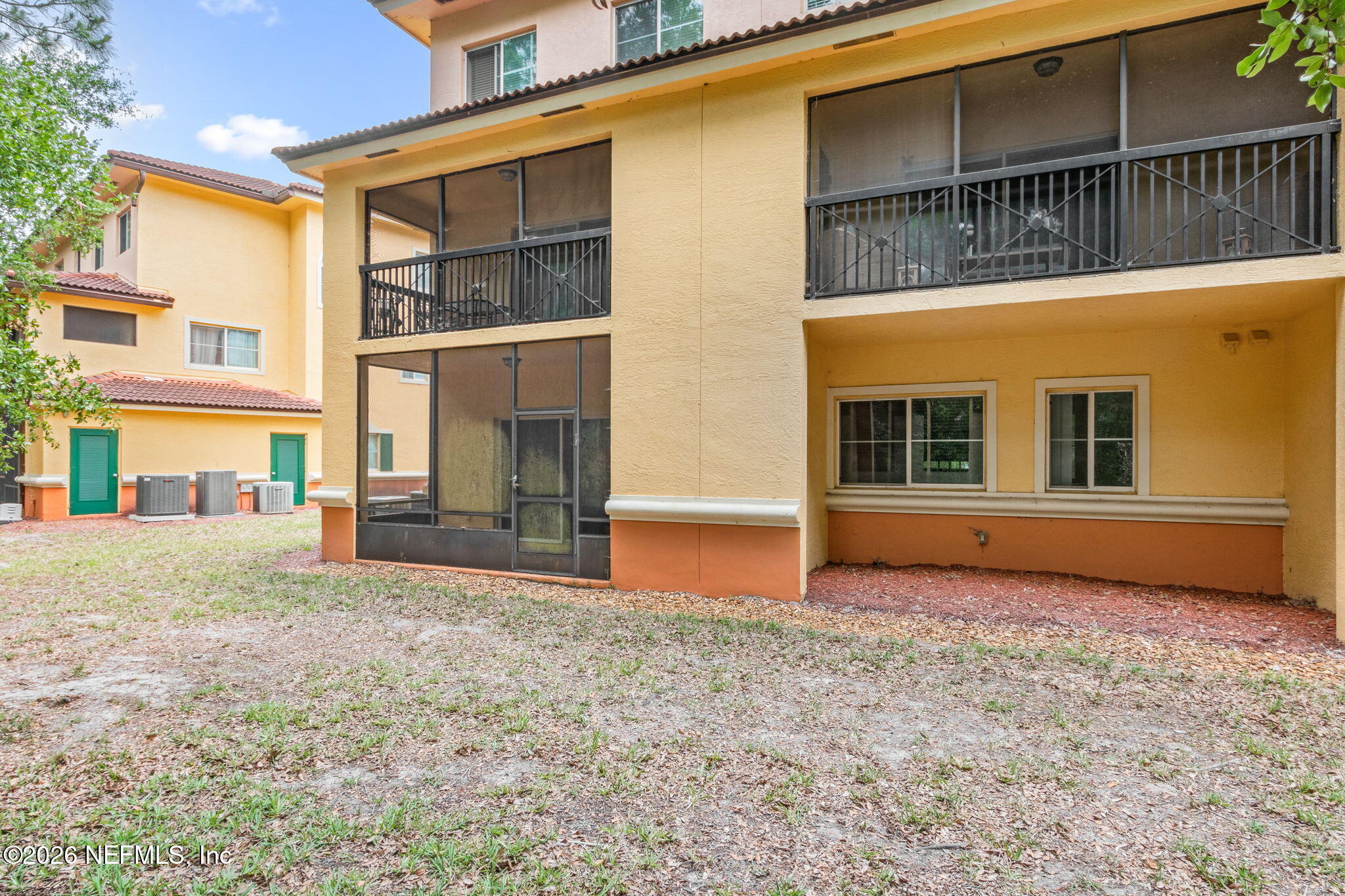 9745 Touchton Road, Unit 1205 Jacksonville, FL 32246 - Photo 20 of 20 a backyard of a house