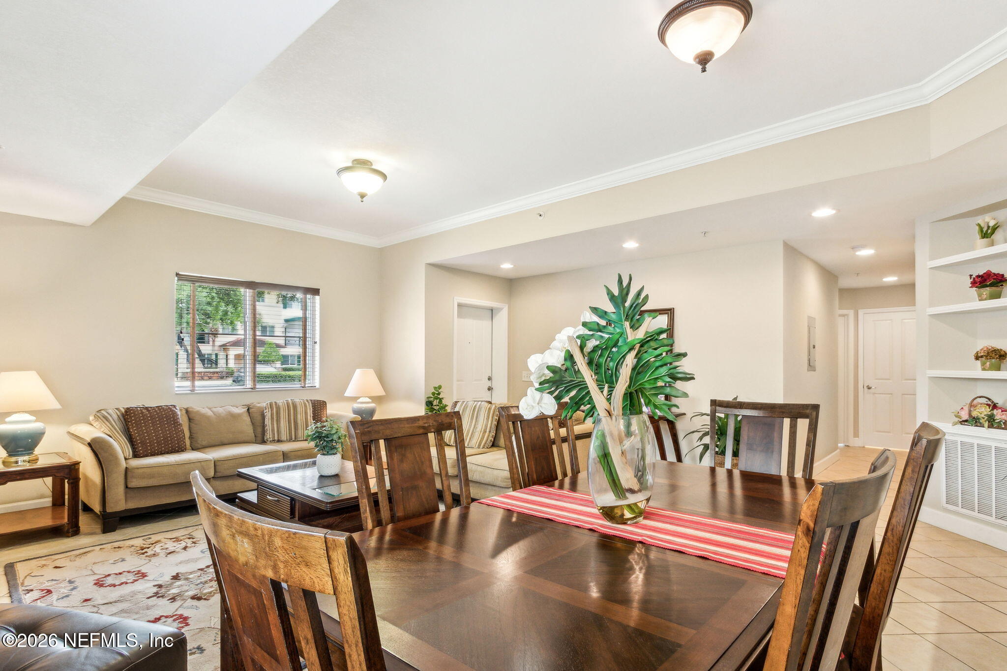 9745 Touchton Road, Unit 1205 Jacksonville, FL 32246 - Photo 5 of 20 a living room with furniture flowerpot and wooden floor